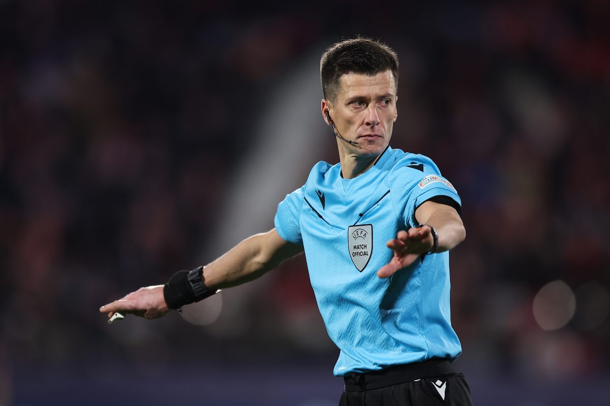 Referee Benoit Bastien gestures during the UEFA Champions League 2024/25 League Phase MD6 match between Girona FC and Liverpool FC at Montilivi Stadium on December 10, 2024 in Girona, Spain
