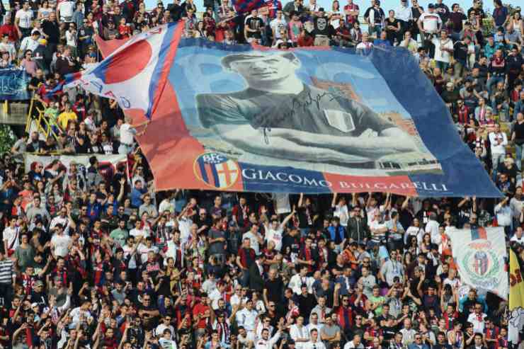 supporters of Bologna FC hold a banner representing Giacomo Bulgarelli former player of Bologna FC on the 60's during the Serie A match between Bologna FC and AS Livorno Calcio at Stadio Renato Dall'Ara on October 27, 2013 in Bologna, Italy.