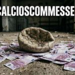 Un pallone sgonfio con banconote a terra - immagine generata da IA