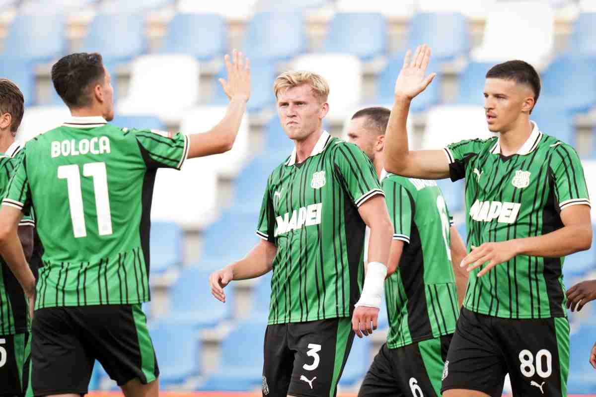 Doig esulta con i compagni