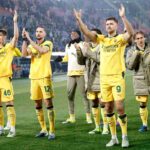 I calciatori del Milan esultano