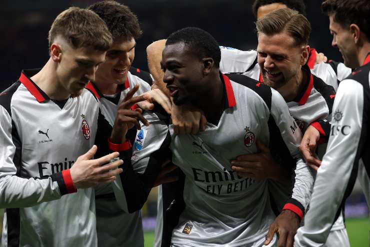 I calciatori del Milan esultano