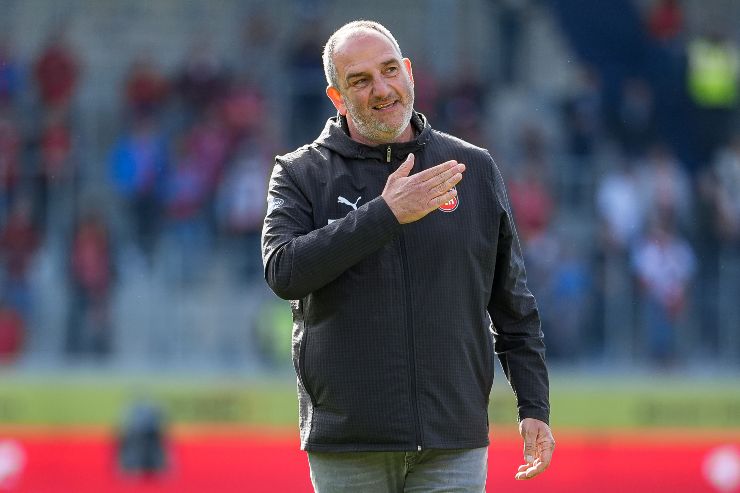 HEIDENHEIM, GERMANY - MAY 16: Frank Schmidt, Head Coach of 1. FC Heidenheim 1846, gestures after giving a speech to the fans following relegation from the Bundesliga after the Bundesliga match between 1. FC Heidenheim 1846 and 1. FSV Mainz 05 at Voith-Arena on May 16, 2026 in Heidenheim, Germany. 