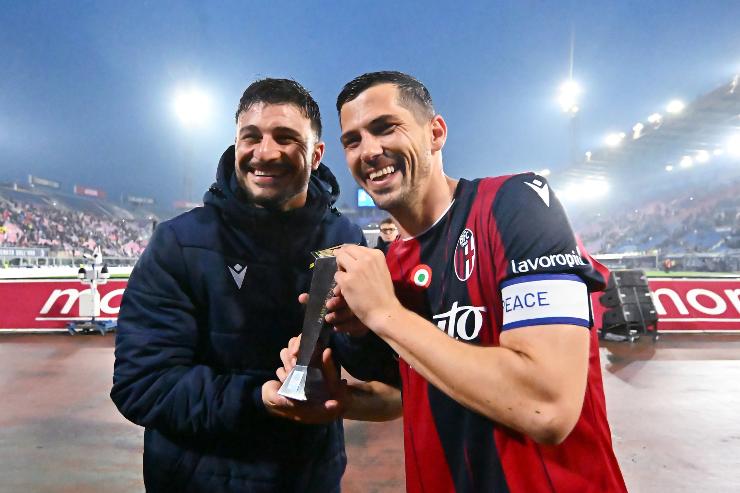 Riccardo Orsolini and Remo Freuler of Bologna celebrate after the team's victory in the Serie A match between Bologna FC 1909 and US Lecce at Renato Dall'Ara Stadium on April 12, 2026 in Bologna, Italy.