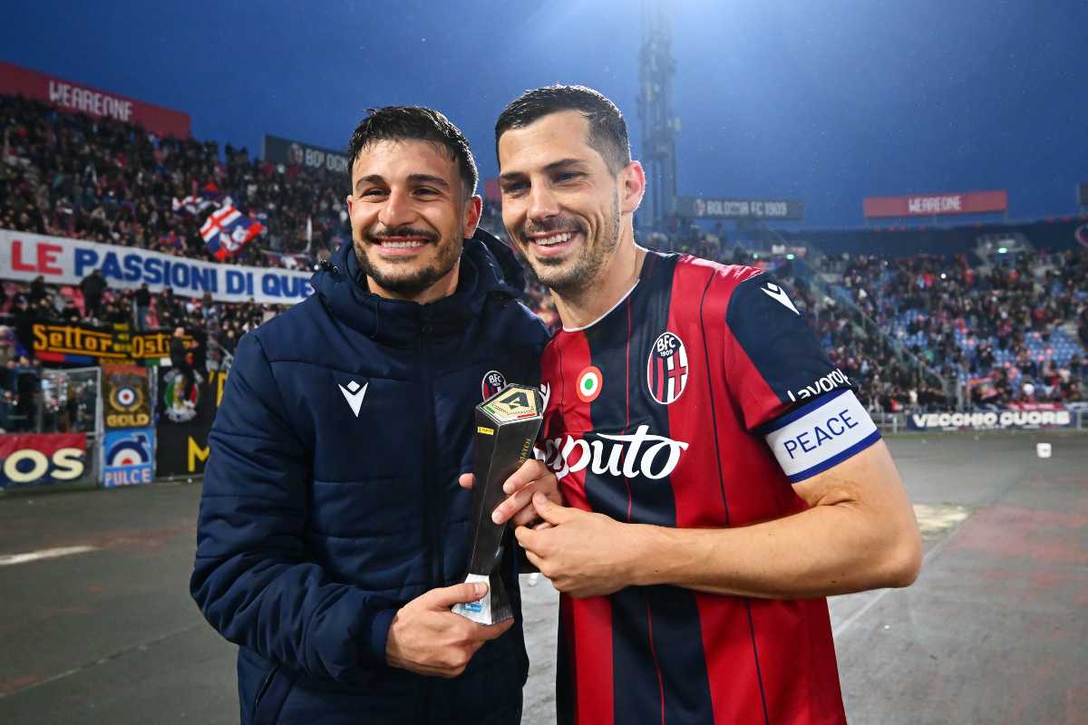 APRIL 12: Riccardo Orsolini and Remo Freuler of Bologna celebrate after the team's victory in the Serie A match between Bologna FC 1909 and US Lecce at Renato Dall'Ara Stadium on April 12, 2026 in Bologna, Italy.