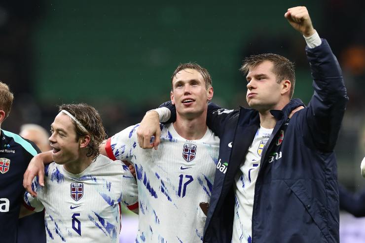 Patrick Berg of Norway and Torbjorn Heggem celebrate victory following the FIFA World Cup 2026 qualifier match between Italy and Norway at San Siro Stadium on November 16, 2025 in Milan, Italy.
