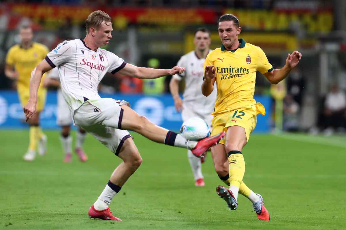 Heggem a contrasto con Rabiot durante Milan-Bologna
