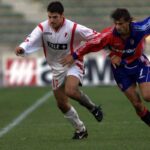 Carlo Nervo del Bologna e Simone Perrotta in Bari-Bologna