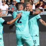 Odgaard e Holm esultano dopo il gol