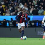 Jhon Lucumí in azione durante Bologna-Inter di Supercoppa italiana