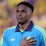 Jhon Lucumí con la divisa della Colombia