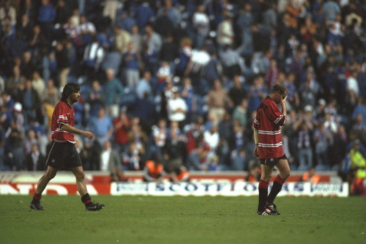 Paul Gascoigne (right) and Marco Negri of Rangers walk off the field after the first leg of the Champions League match against IFK Gothenburg in Gothenburg, Sewden. IFK Gothenburg won the match 3-0.