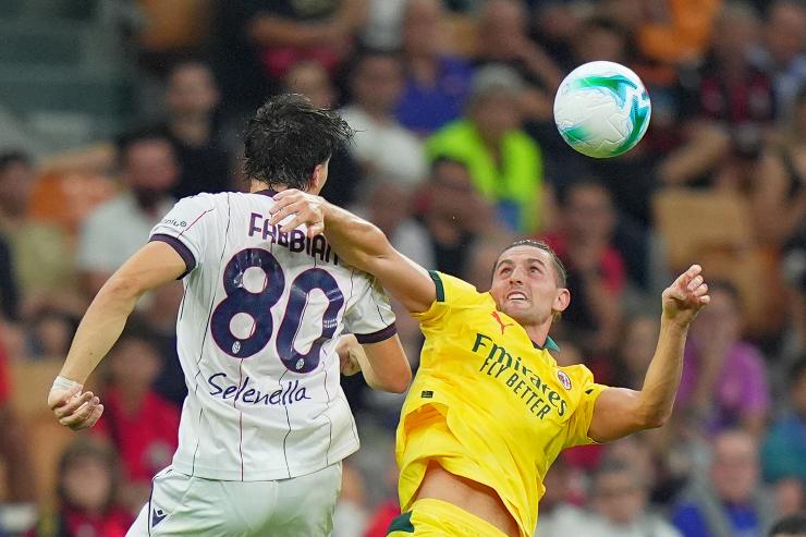 Giovanni Fabbian in contrasto in Milan-Bologna