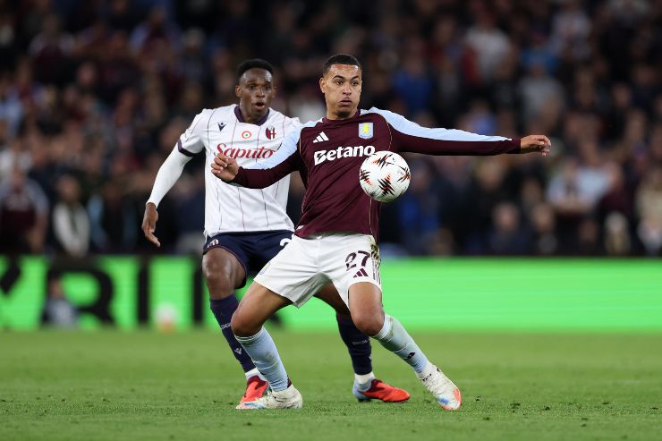 Morgan Rogers of Aston Villa is chased down by Jhon Lucumi of Bologna FC 1909 during the UEFA Europa League 2025/26 League Phase MD1 match between Aston Villa FC and Bologna FC 1909 at Villa Park on September 25, 2025 in Birmingham, England. 