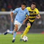 Ugrinic in azione durante la gara contro il Manchester City