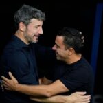 Van Bommel e Xavi prima di una partita