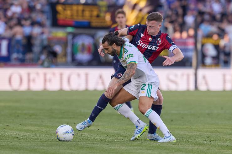Lewis Ferguson in contrasto con Mario Hermoso